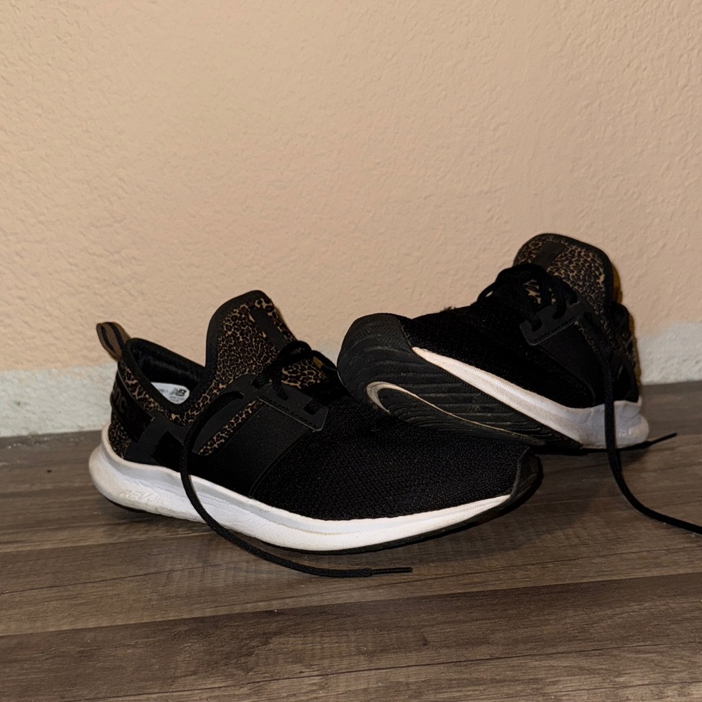 New Balance Black and Animal Print Sneakers